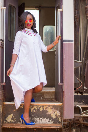 White linen shift dress with Ankara details